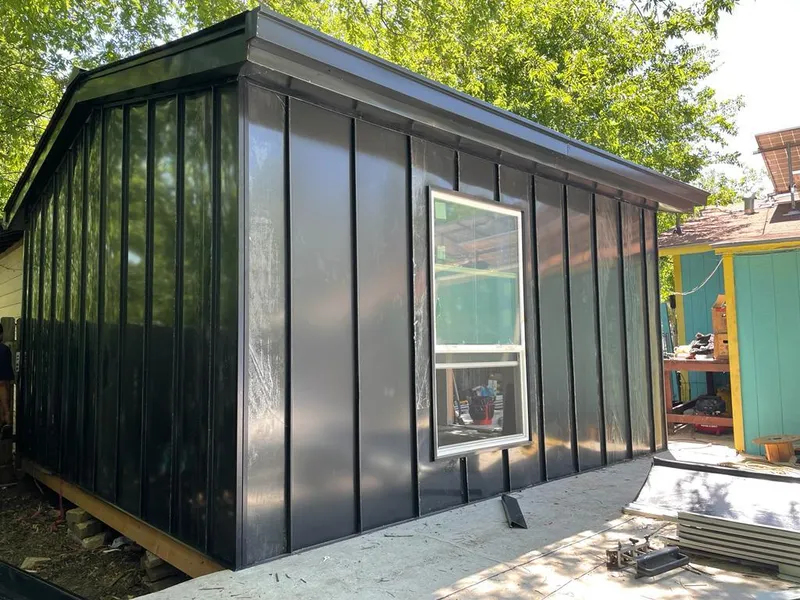 Black standing seam metal wall panels for Roof Inspection in Moses Lake